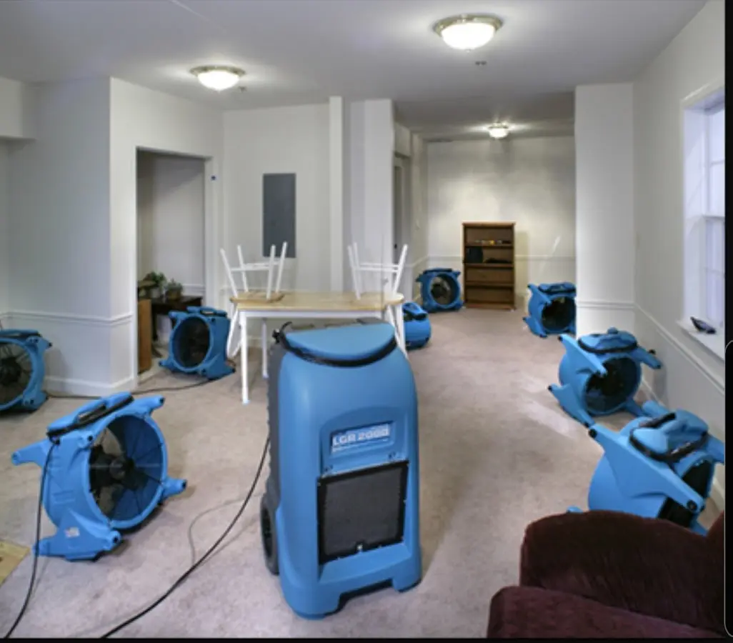Air movers and dehumidifier setup for Water Damage Restoration in Green Lake